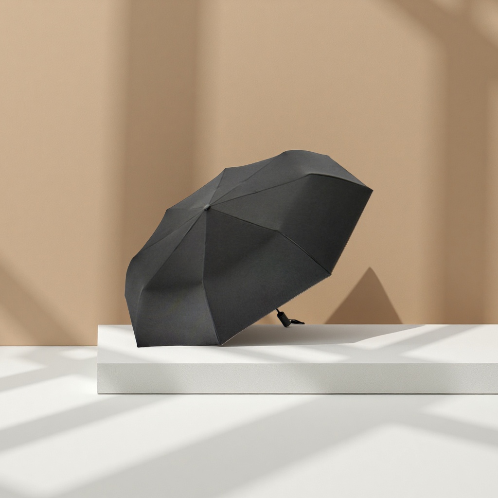 Black high-density impact-resistant fabric umbrella, three-fold portable, wind-resistant, sun-proof and lightweight