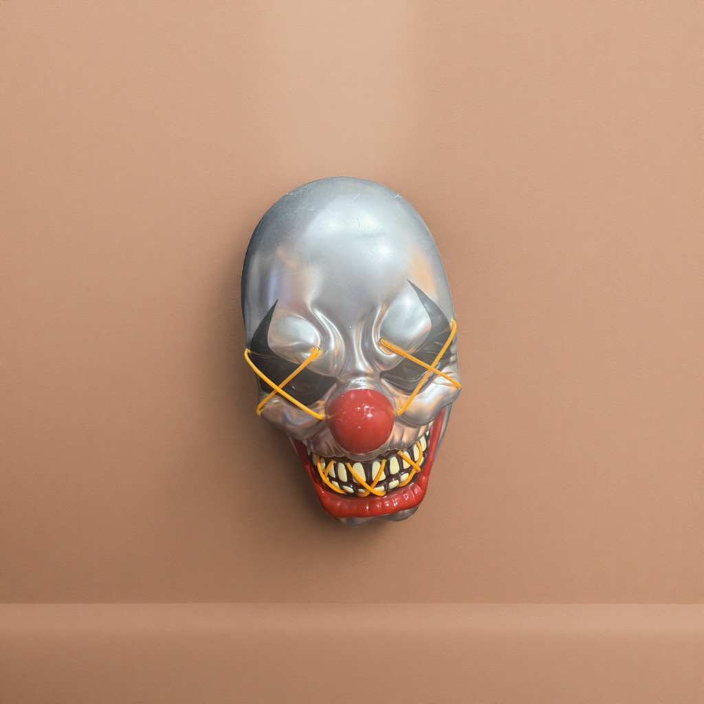 The horror clown mask is made of PVC soft rubber, which is lightweight and breathable. It is a Halloween performance prop Specification image