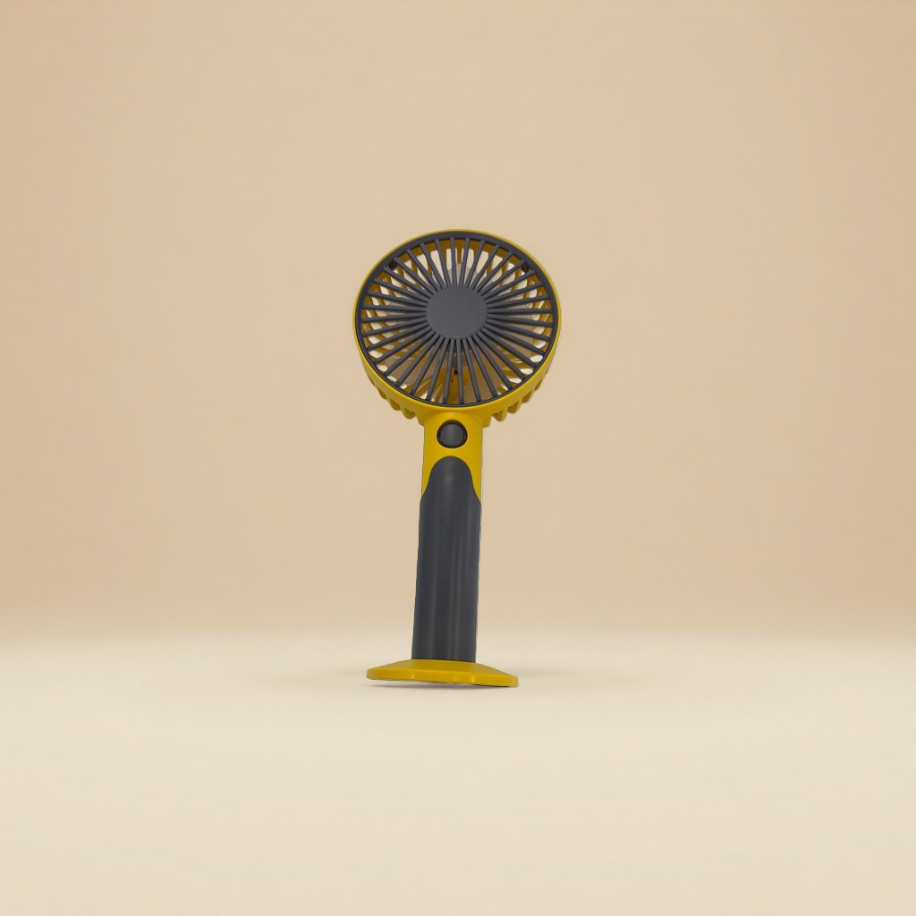 The yellow handheld fan body is a portable silent small fan, a summer cooling wonder