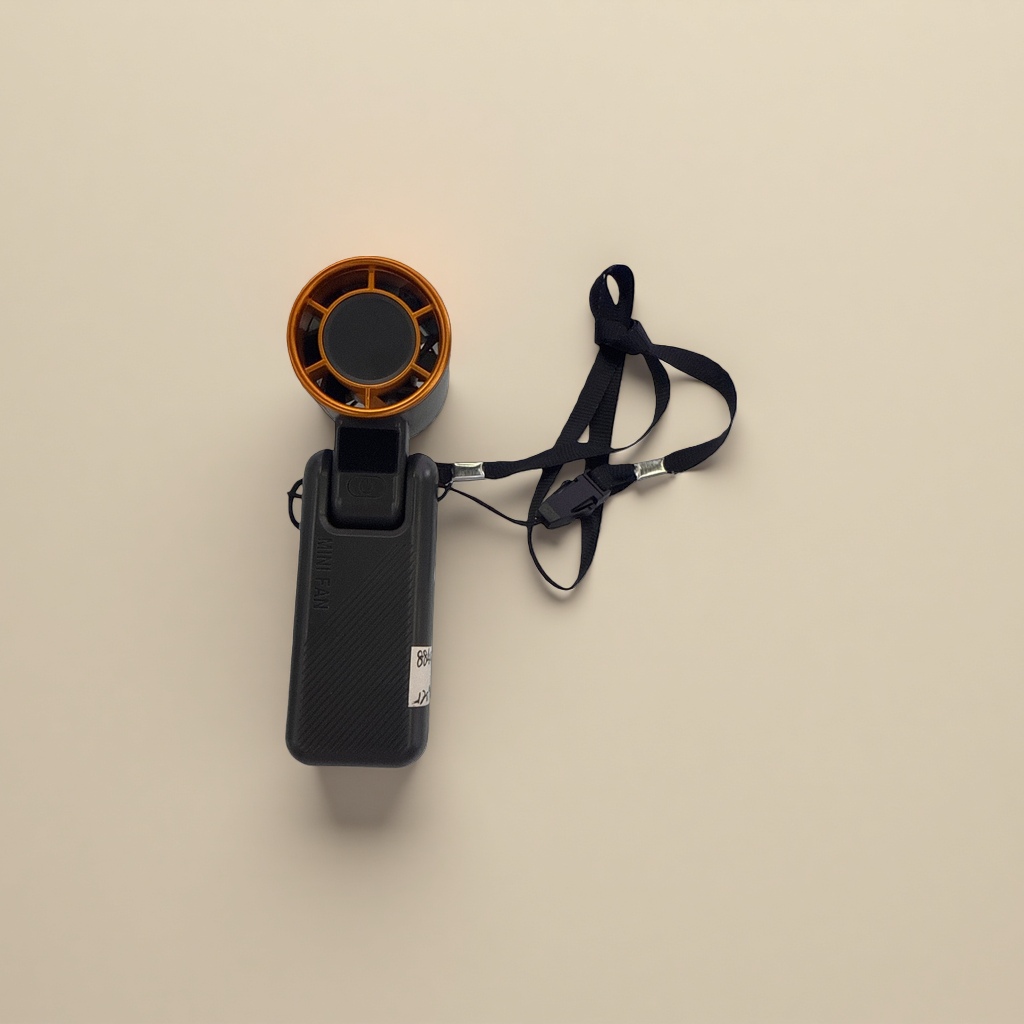 Portable mini fan with USB charging, compact and quiet, essential for dormitories, offices and travels Application Scenario