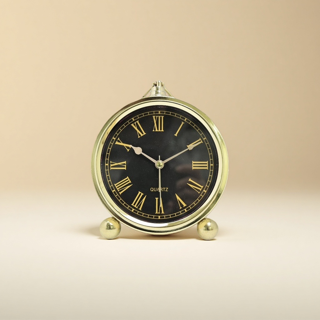 Retro golden frame, black dial alarm clock, mechanical pendulum clock, bedroom and living room decoration details Picture