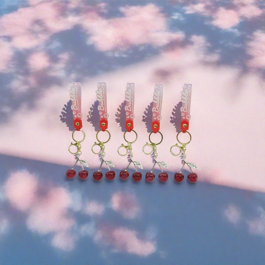 Pink gradient cherry keychain, soft PVC material, suitable for both car bags and hanging Specification image