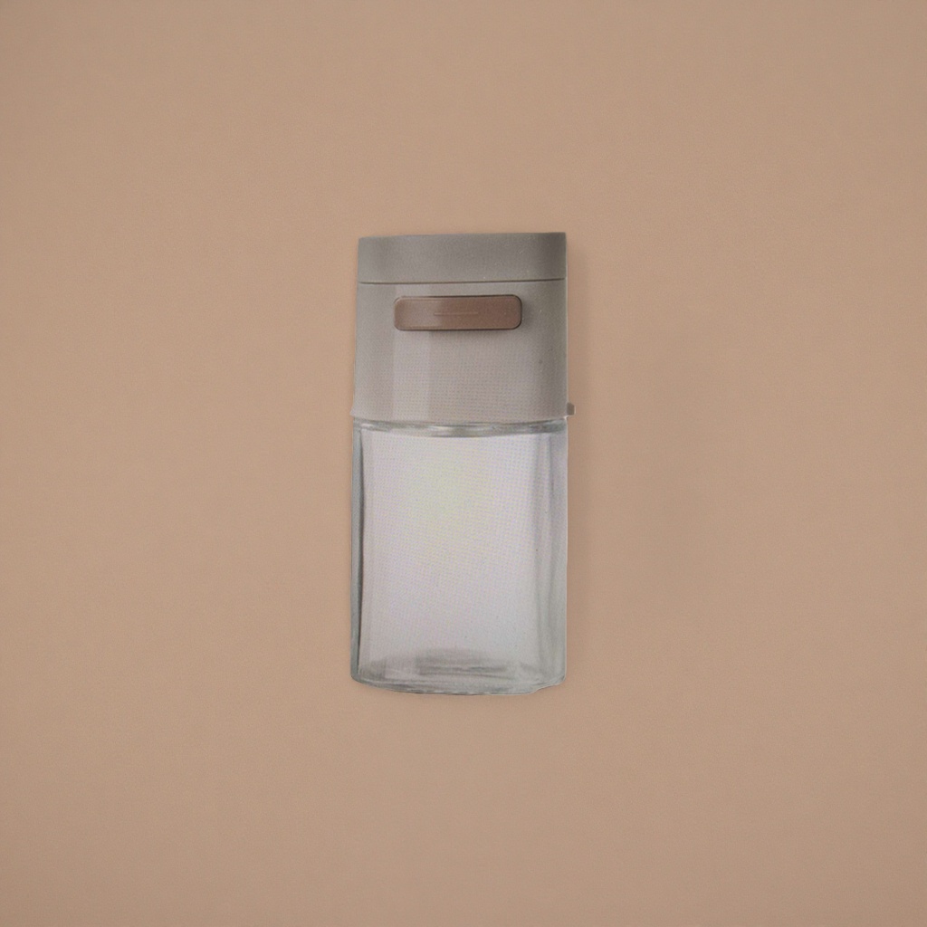Transparent glass bottle with beige cap container, suitable for home storage, kitchen and bathroom details Picture