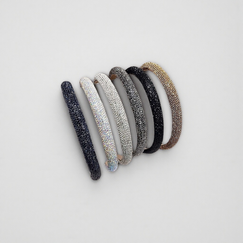 A dazzling diamond-encrusted hairband in five colors: deep blue, silver, black, gold and white. Books are displayed Specification image