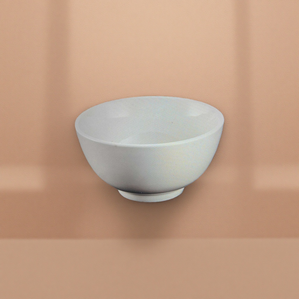 The white ceramic bowl is a simple household dining bowl with a high-temperature resistant glaze that is smooth and easy to clean Application Scenario