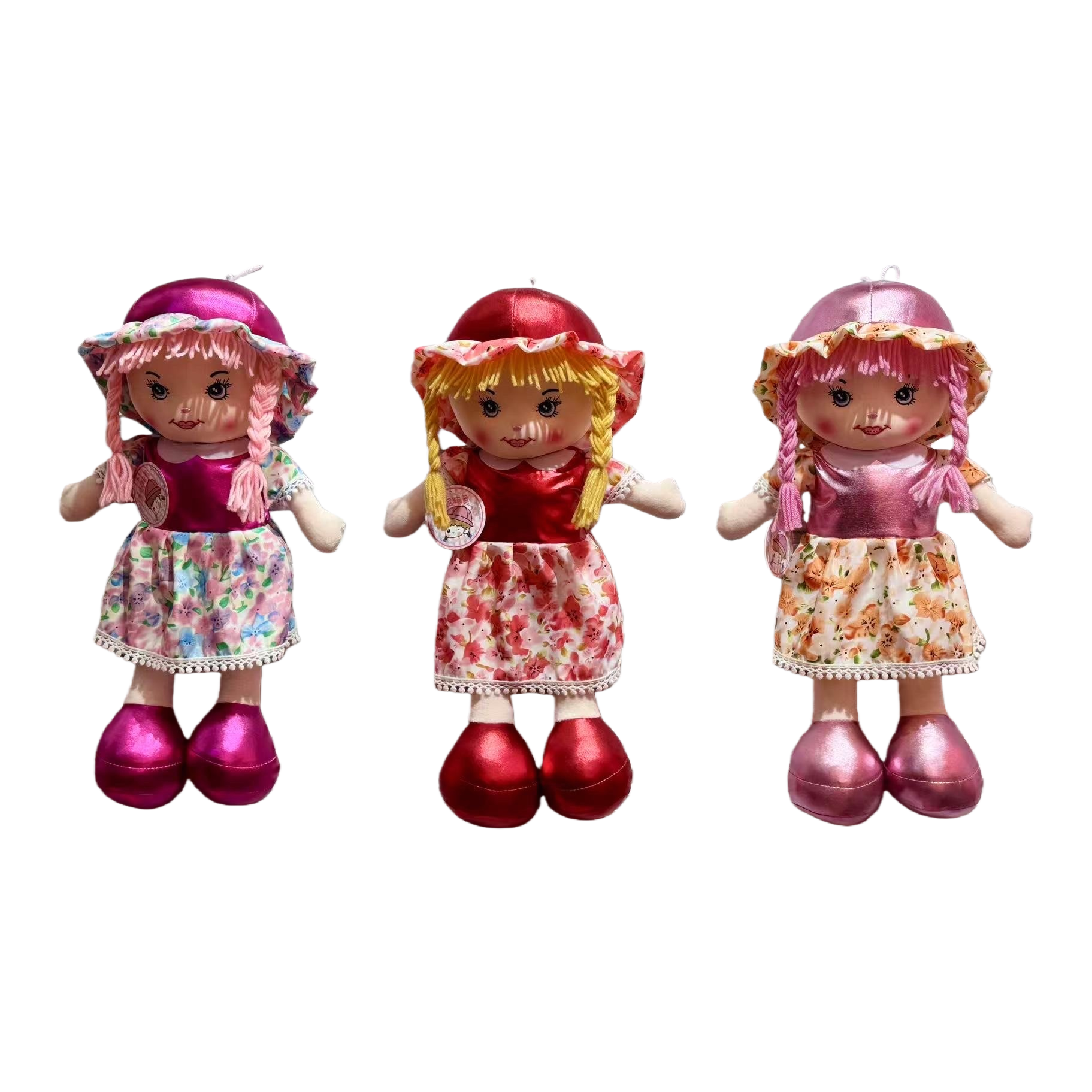 Three fabric dolls, a colorful dress, a hat, and a cloth doll are placed in front of the blinds Item Picture