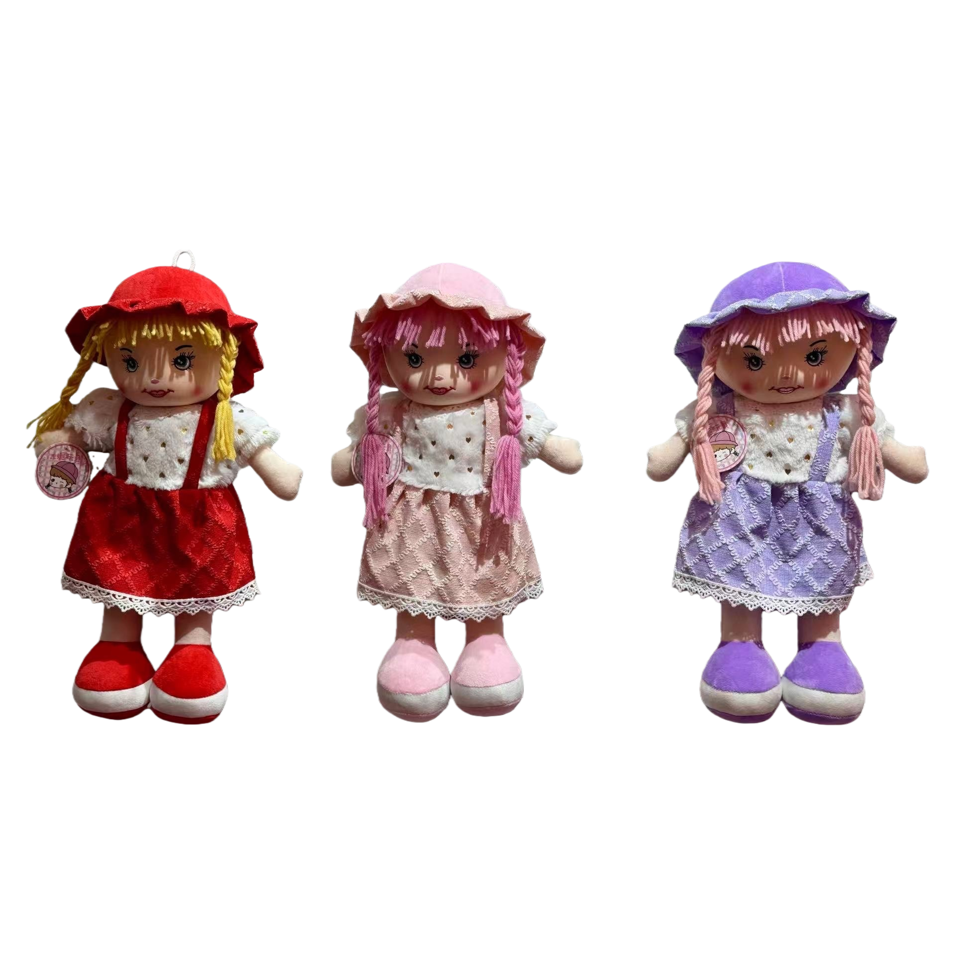 A three-piece plush doll set, red, pink and purple dress, hat, posed in front of the blinds Item Picture