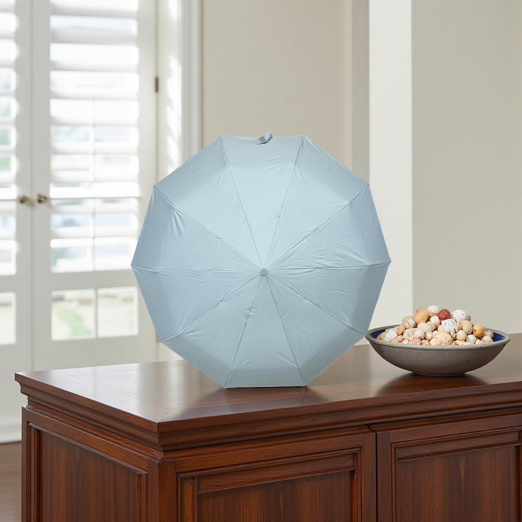 This portable folding umbrella is lightweight, windproof, sun-proof, and suitable for both sunny and rainy days. It can be opened and closed with one button details Picture