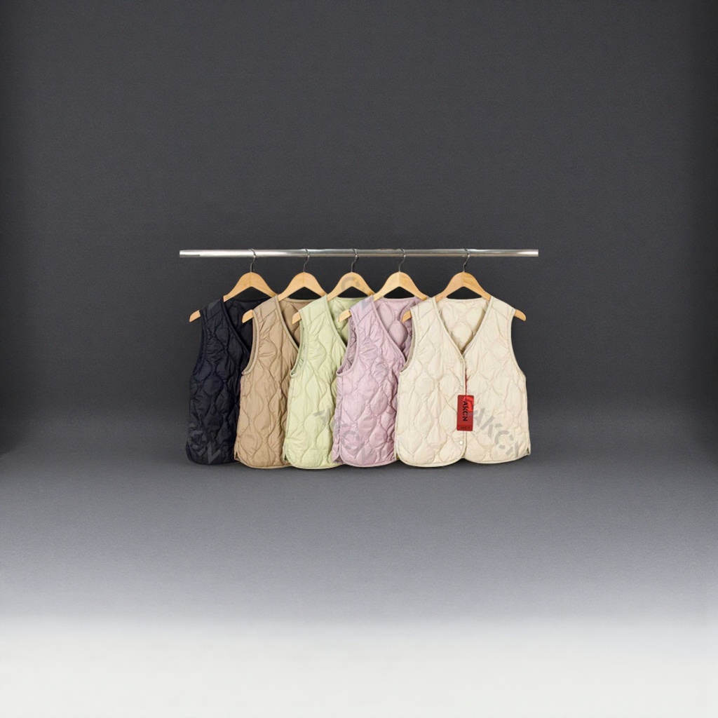Description words: Multi-color quilted vest Main body: Five quilted sleeveless vests of different colors, hung on a hanger for display. The colors include black, khaki, light green, light pink and off-white Application Scenario