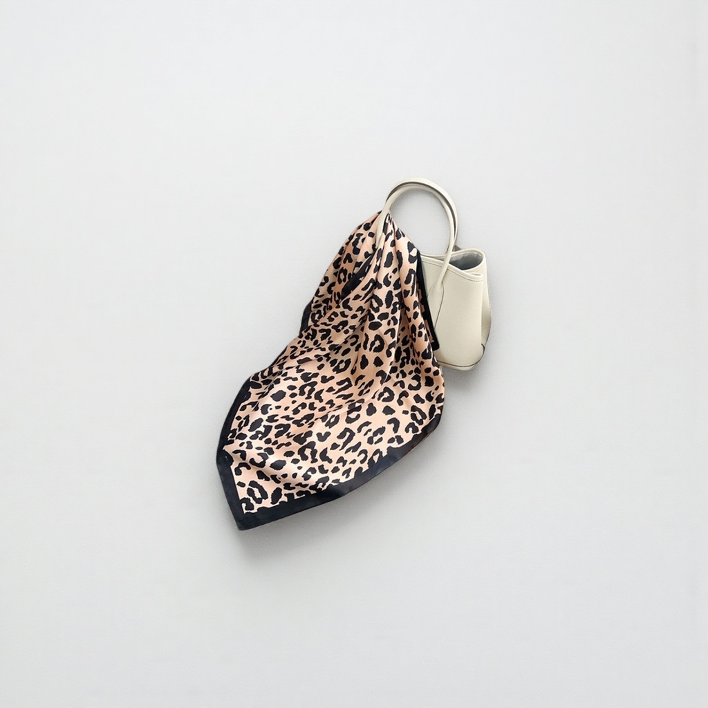 A leopard print pattern silk scarf is a fashionable and versatile silk blend scarf for women in spring and summer Application Scenario
