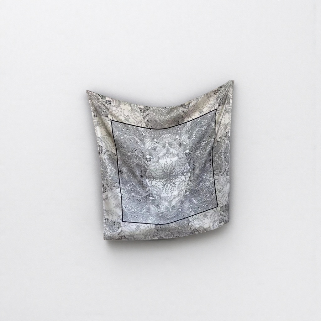 The black and white patterned silk scarf is light, breathable and elegant, a versatile and fashionable accessory