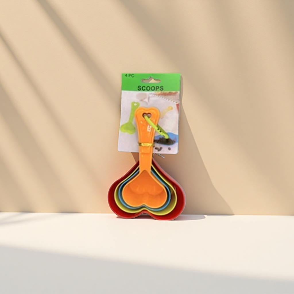 Colorful heart-shaped measuring spoon, a precise measuring tool for kitchen baking details Picture