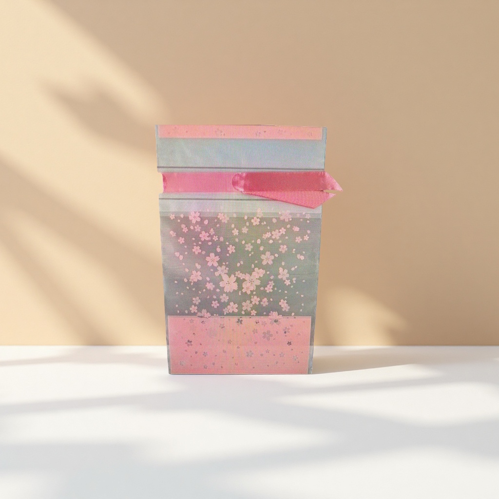 The cherry blossom-patterned packaging bag is a fashionable, simple and eco-friendly shopping bag that can be reused Specification image