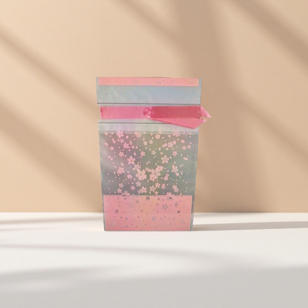 The cherry blossom-patterned packaging bag is a fashionable, simple and eco-friendly shopping bag that can be reused details Picture