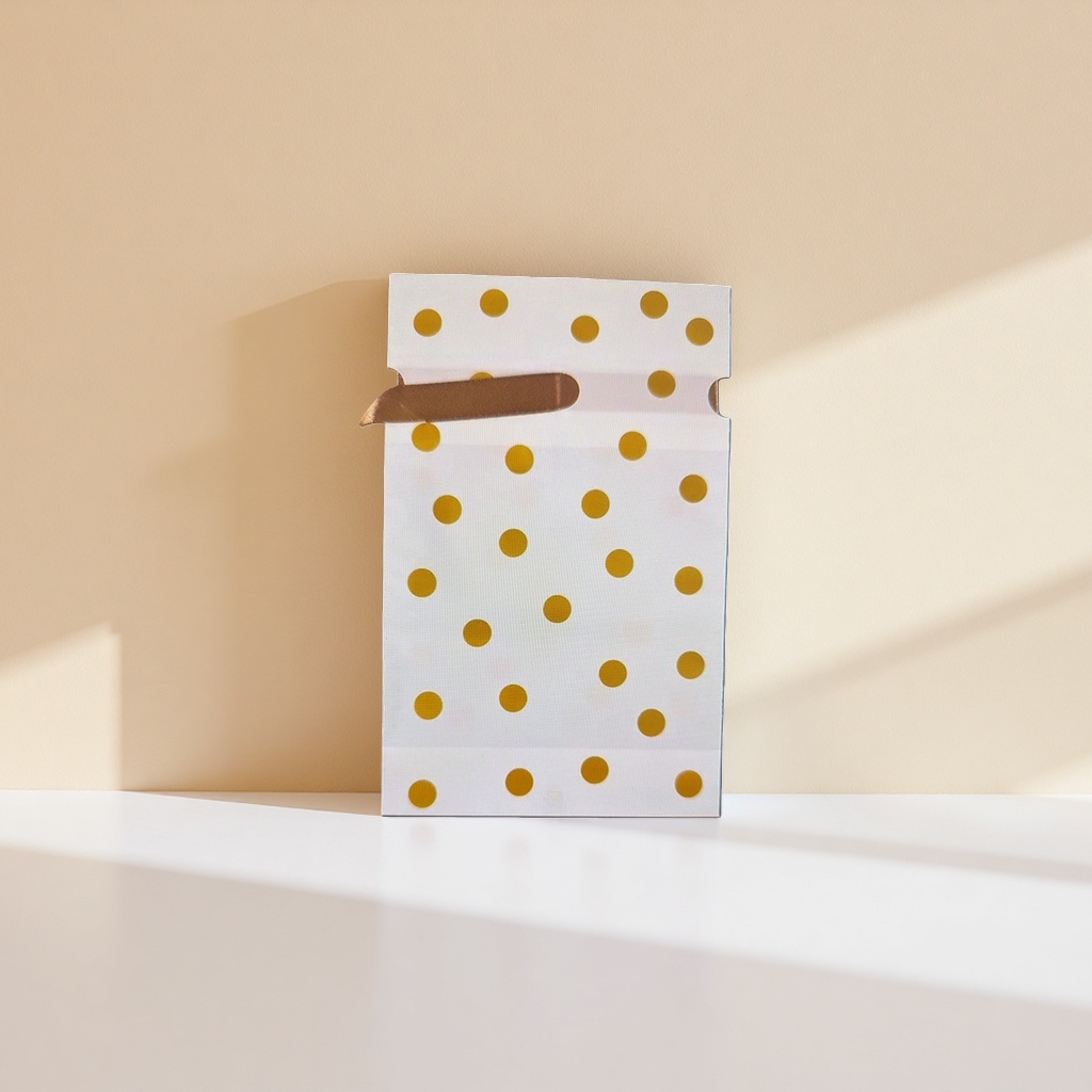 A fashionable and simple gift box packaging bag with white and golden dots details Picture