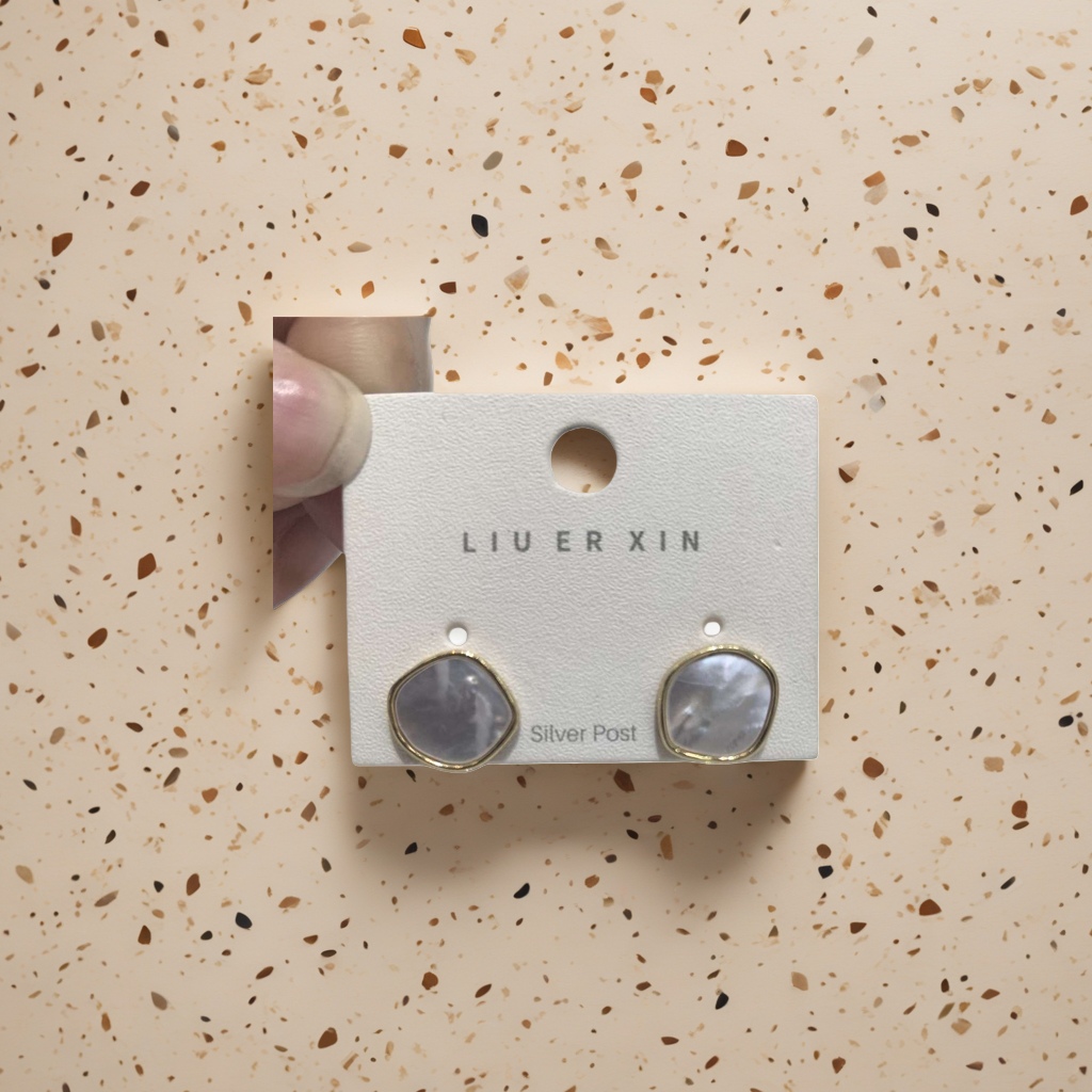 A pair of fashionable and simple ear studs made of anti-allergy alloy