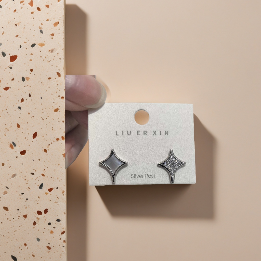A pair of ear studs, simple and fashionable earrings made of anti-allergy alloy