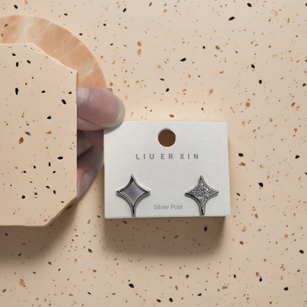A pair of ear studs, simple and fashionable earrings made of anti-allergy alloy details Picture
