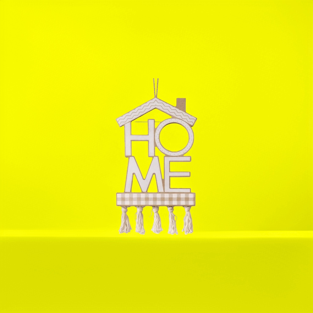 The house is shaped like a HOME with wavy roof, checkered bottom and tassel decoration