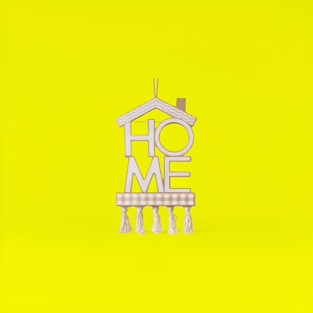 The house is shaped like a HOME with wavy roof, checkered bottom and tassel decoration Application Scenario
