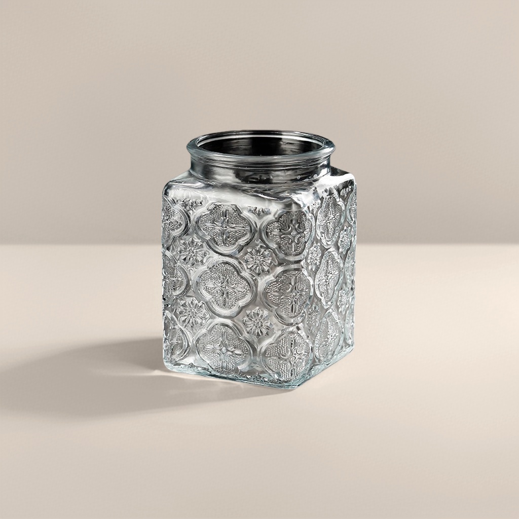 A transparent glass bottle with a square pattern design for storage, a household storage bottle container details Picture