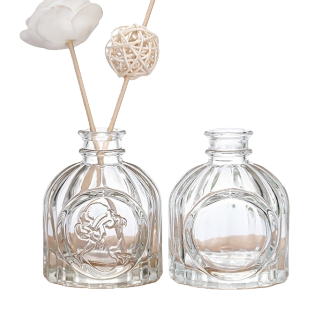 A beauty face embossed aromatherapy glass bottle for indoor fragrance display, home decoration Item Picture
