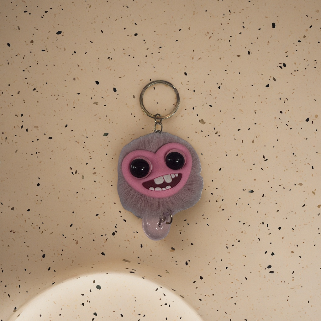 The pink plush keychain is a cute and soft pendant as a gift decoration Specification image