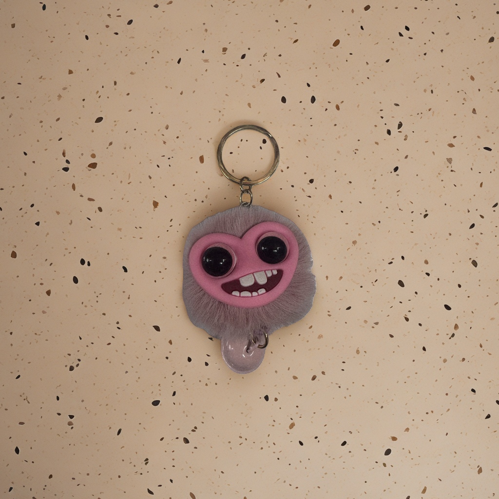 Pink plush monster-shaped keychain, cute and soft pendant, car bag accessory Application Scenario