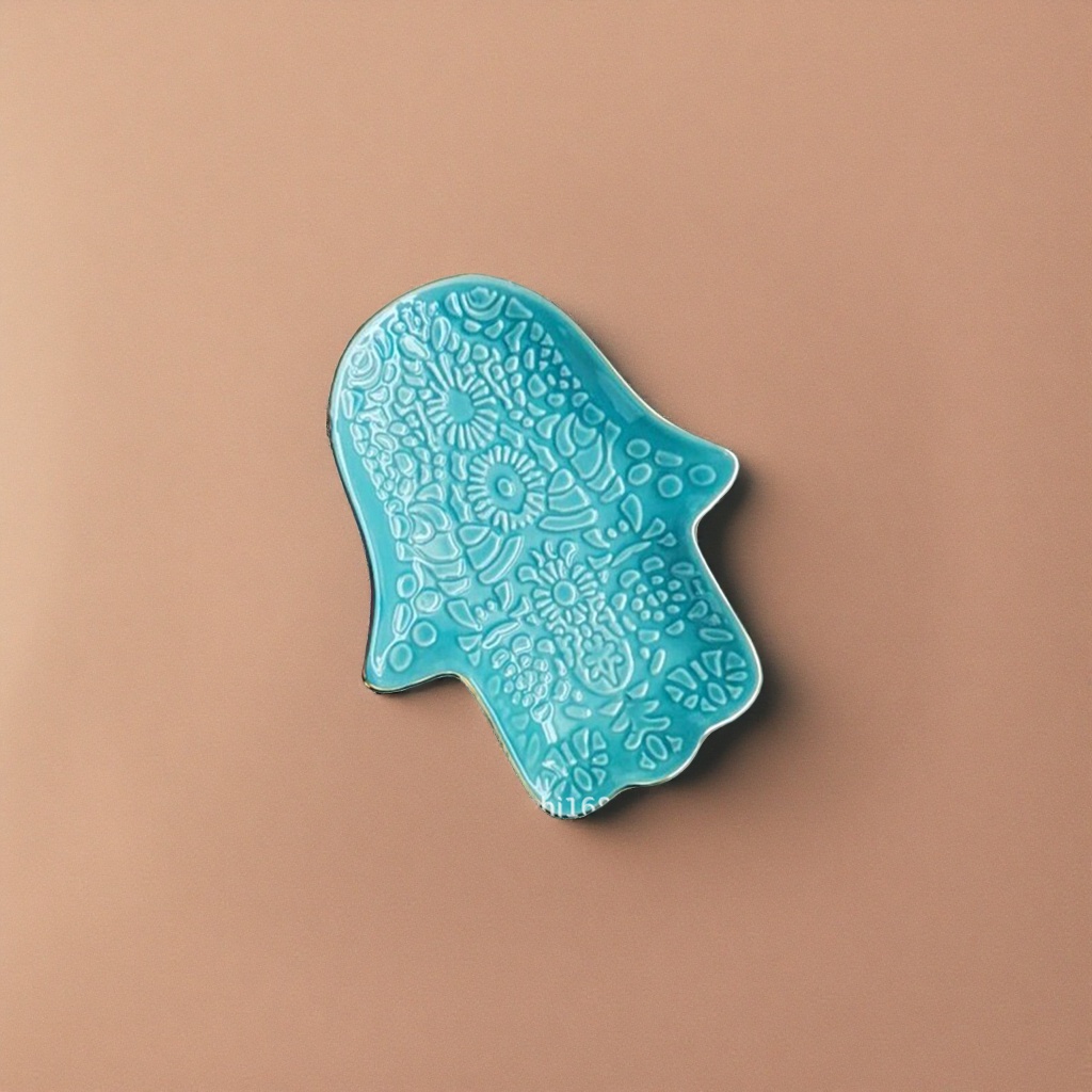 Green hand shape, blue ceramic plate, floral geometric relief with golden edges Application Scenario
