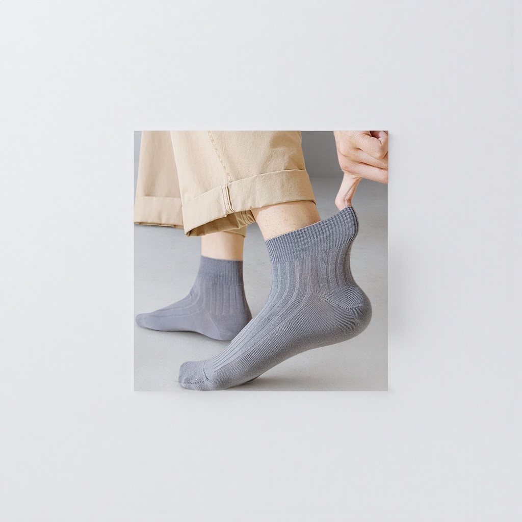 A pair of pure cotton mid-calf grey socks for both men and women