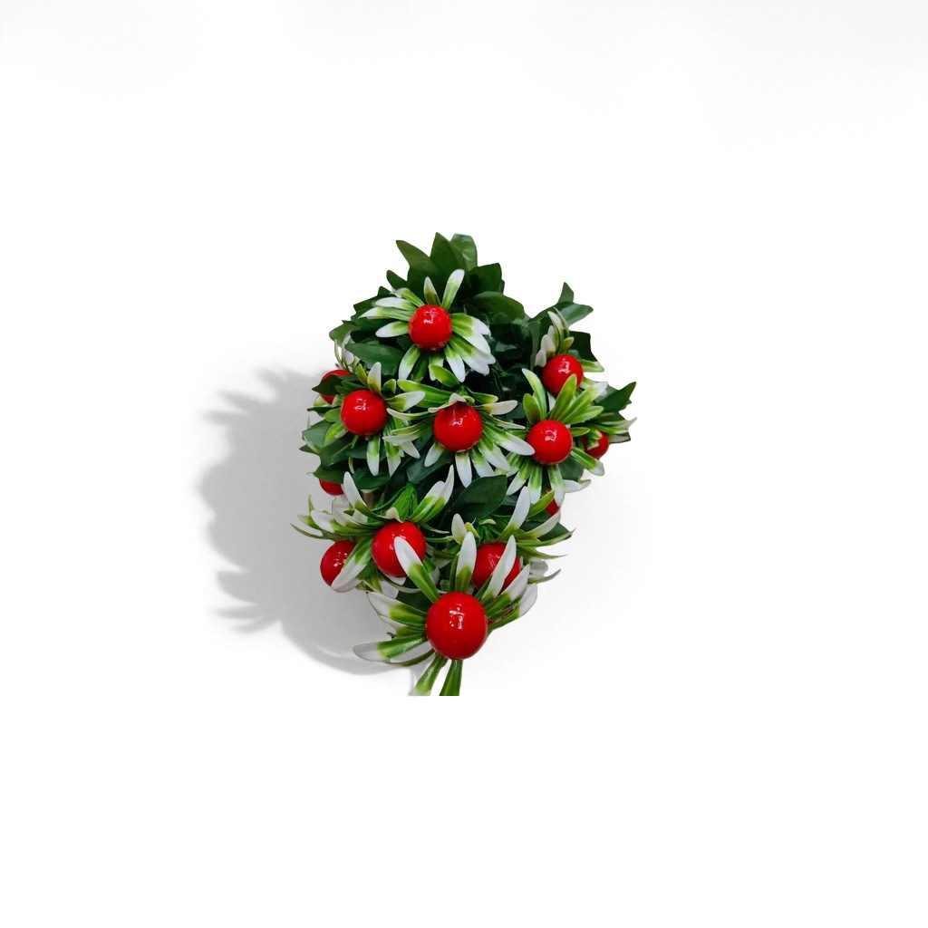 Red fruits, green leaves and white petals are decorative bouquets and simulated floral art pieces