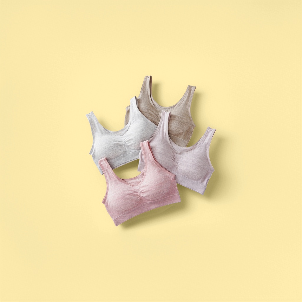The light grey, beige, light pink and light pink bras without underwire are laid flat to show the comfort of light-colored bras for women in summer Specification image