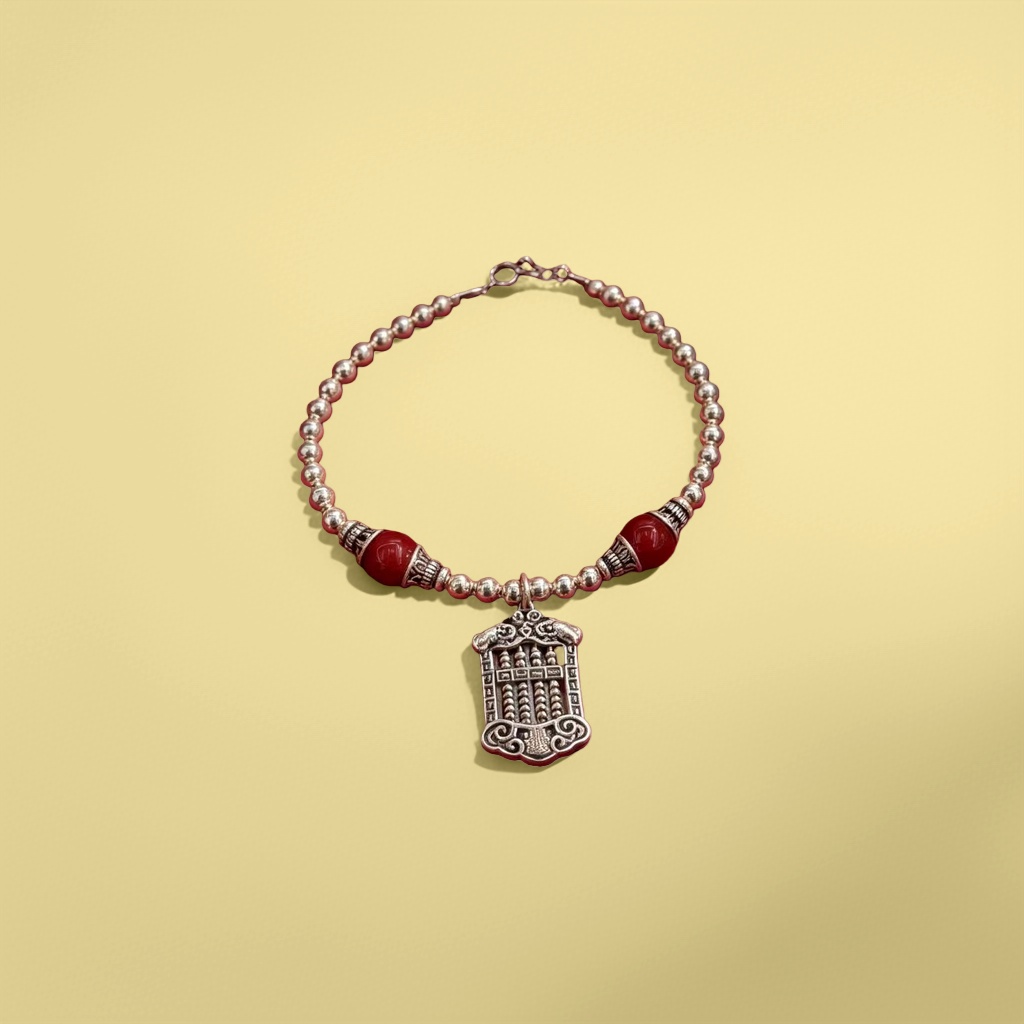 A silver necklace in a red velvet box Specification image