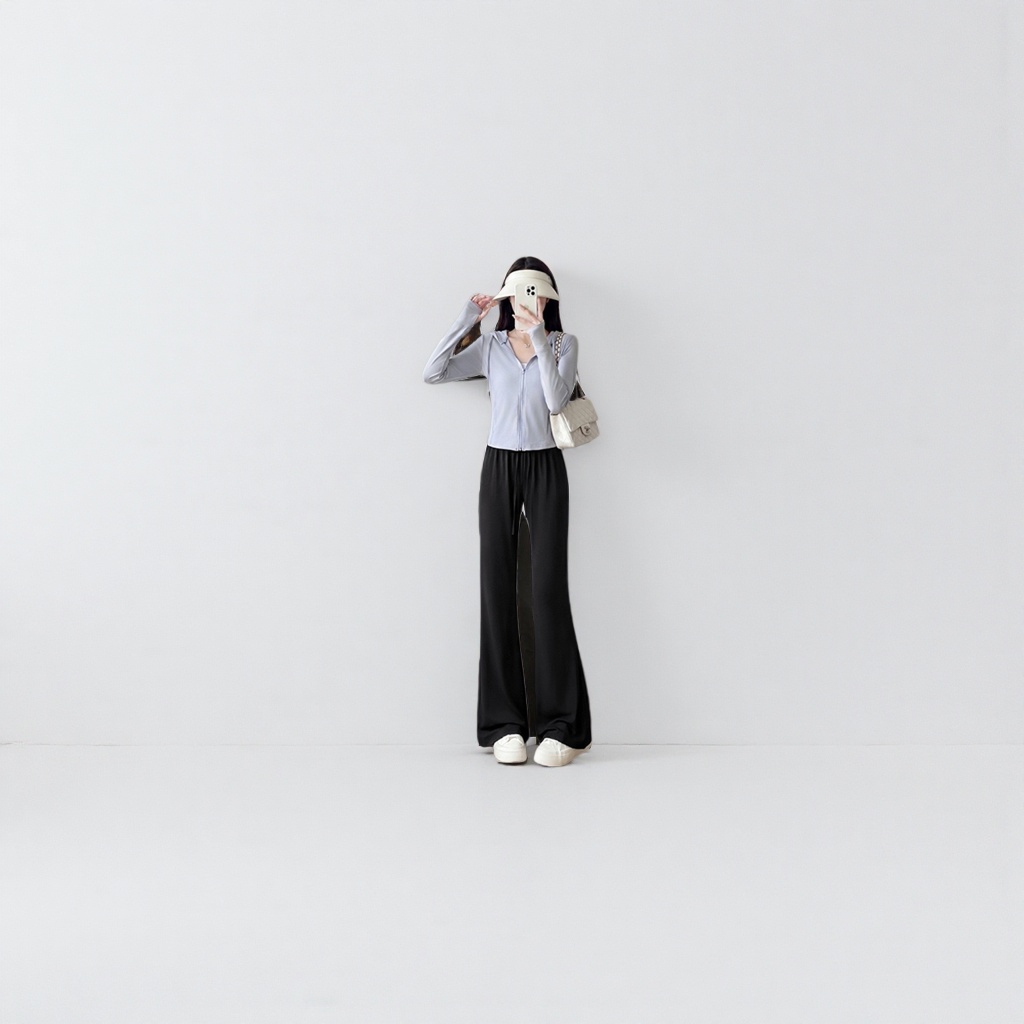 Black wide-leg pants for women, with a high waist and a slimming effect, are the same style for models