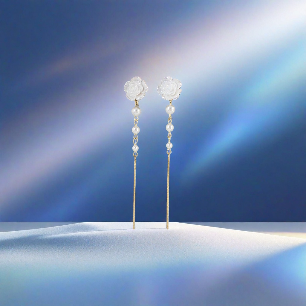 White flower pearl tassel earrings are fashionable and elegant earrings for ladies