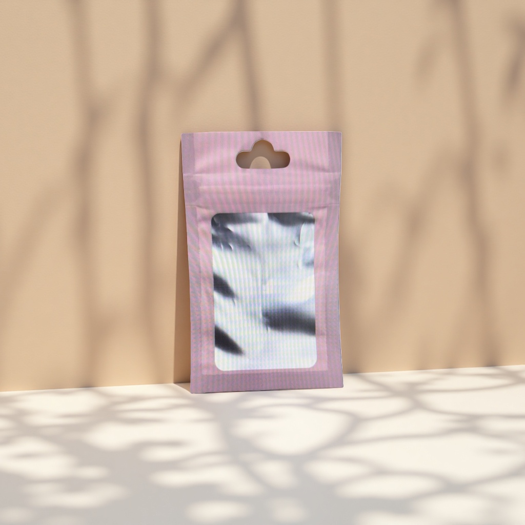 The pink perforated packaging bag contains a fashionable and portable storage bag with silver reflective items Application Scenario
