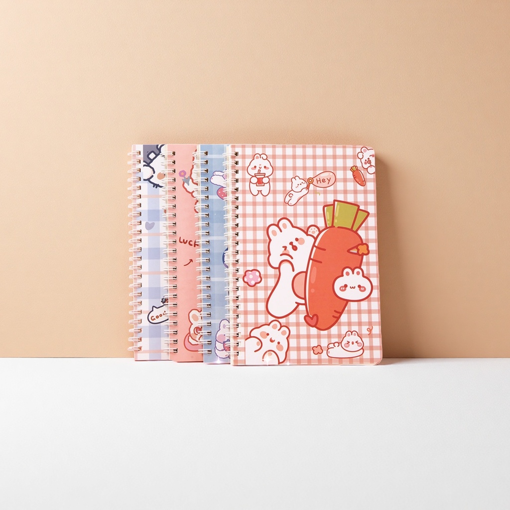 The pink checkered cartoon rabbit holding a carrot notebook A5 has thickened inner pages that can be torn off