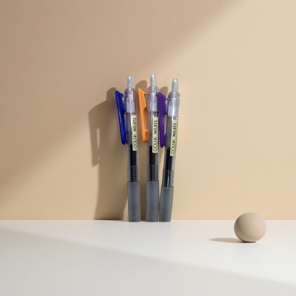 A set of three colored press-pen student office gel pens in black, blue and red details Picture