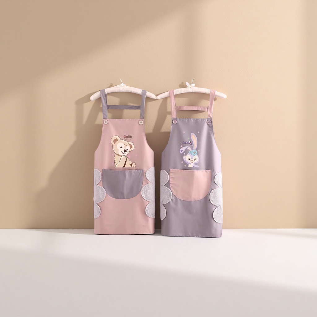 A pink and grey cartoon apron with a teddy on the left and a rabbit on the right, and double pockets with plush decoration Specification image