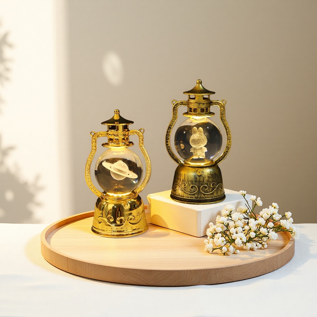 A golden retro kerosene lamp-shaped table lamp with a Saturn on the left and a rabbit on the right, featuring a double model decorative lamp details Picture