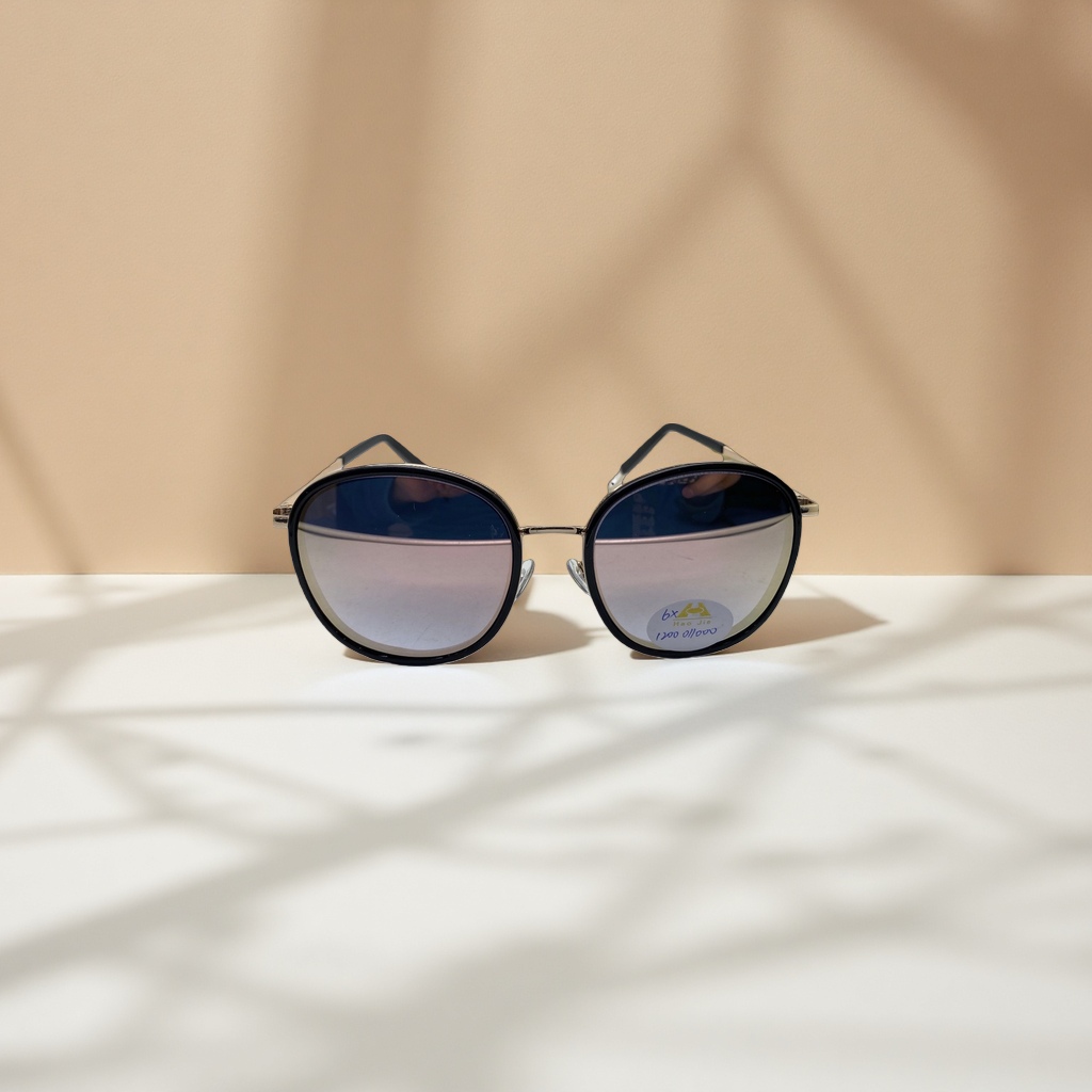 Black-framed, gold-rimmed gradient sunglasses