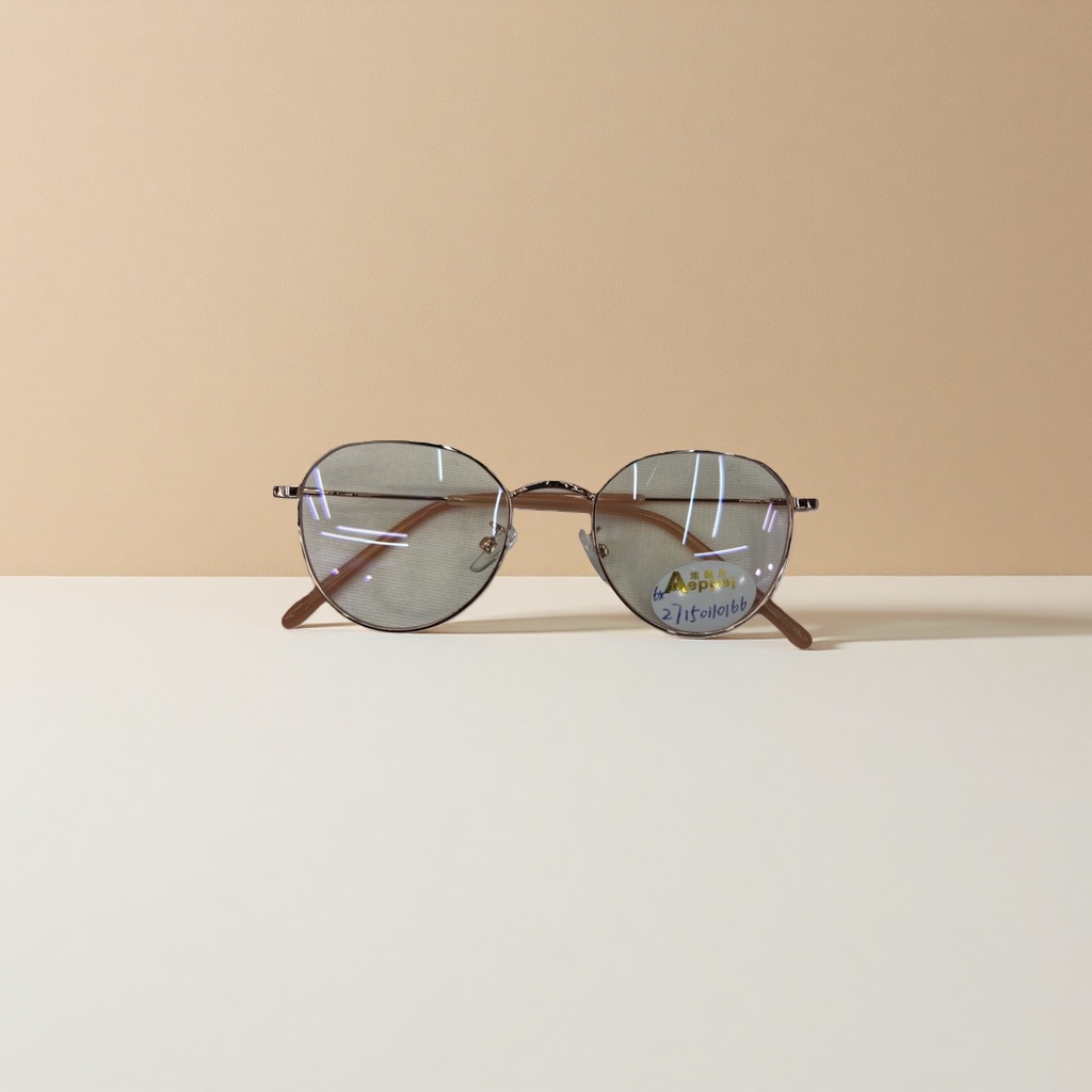 The golden thin-framed glasses are fashionable and lightweight, with metal frames suitable for both men and women