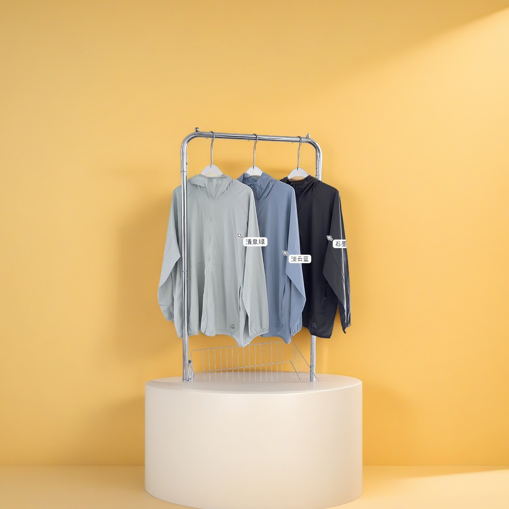 Three-color hooded sun-protective clothing in clear spring green, light cloud blue, graphite gray and metal hangers Application Scenario