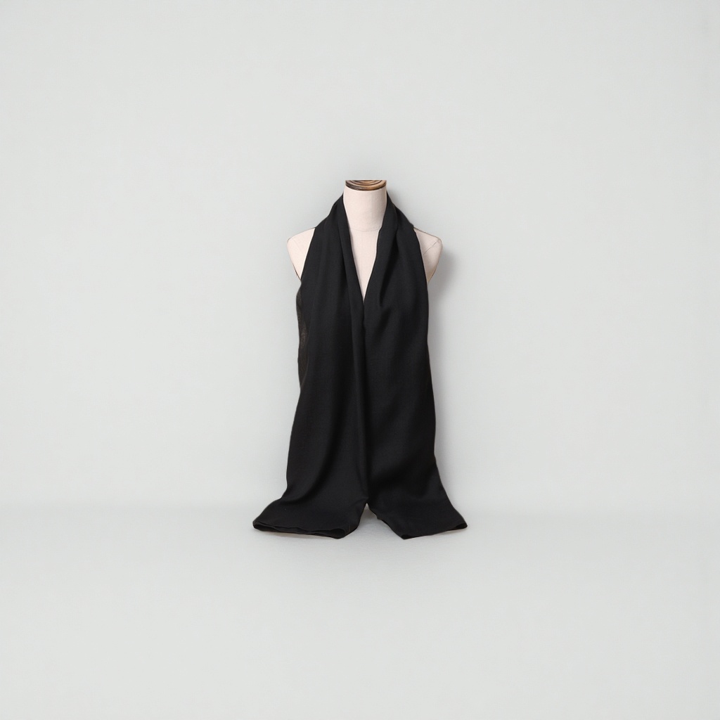 The black cashmere scarf is light, warm and a versatile neck accessory for winter details Picture
