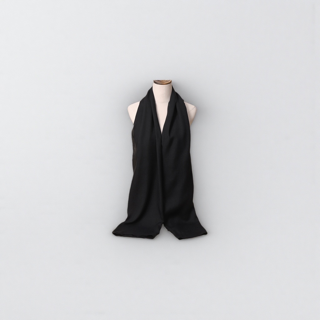The black cashmere scarf is light, warm and a versatile neck accessory for winter