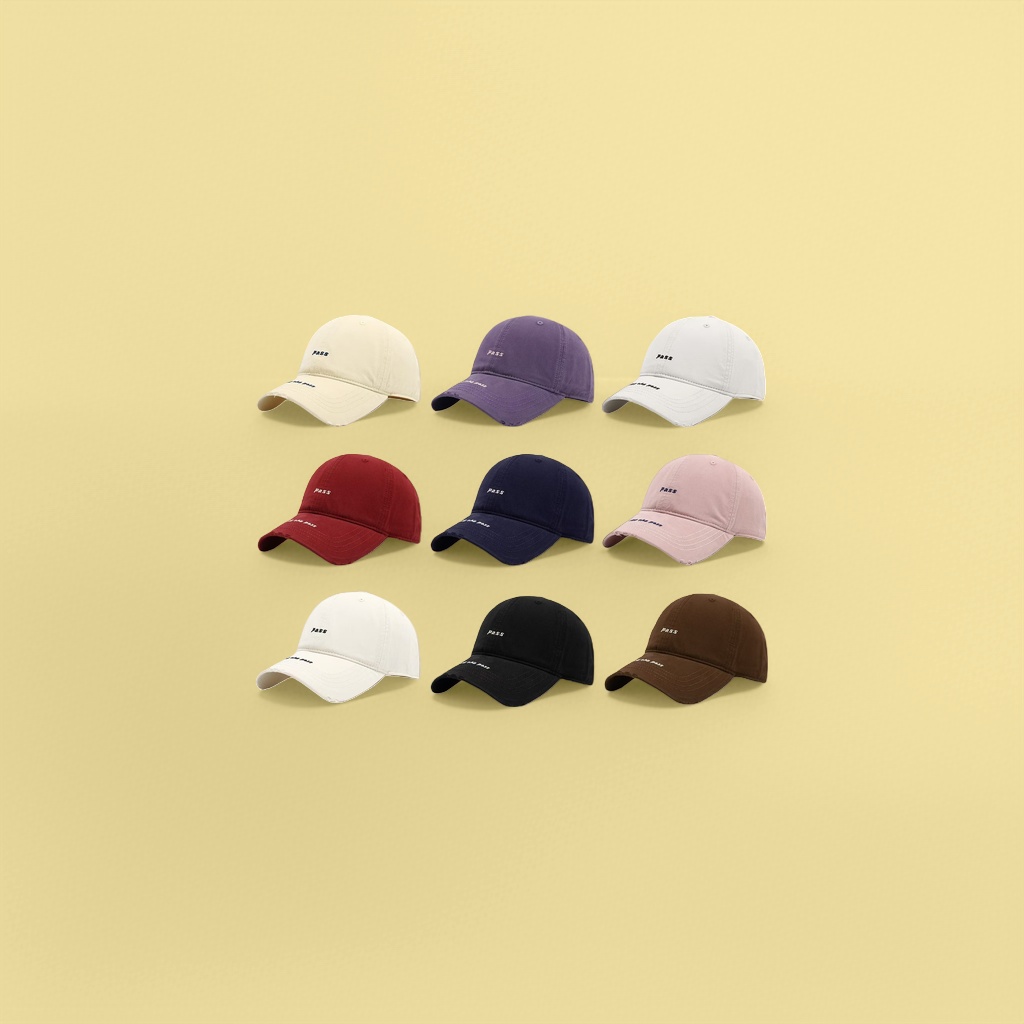 The front of the weathered and worn baseball cap is embroidered with the word "PASS". It's the same style for both men and women