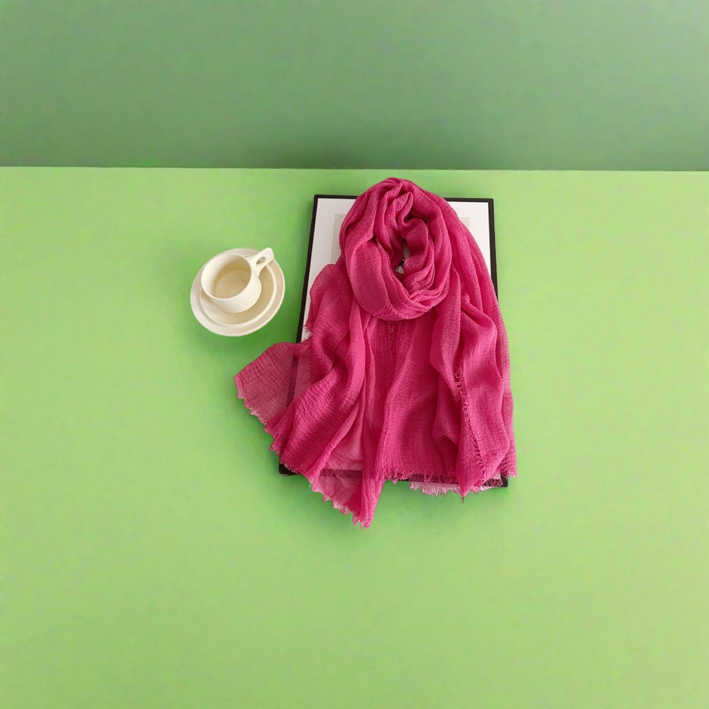 A rose-red pure cotton scarf is a warm, fashionable and versatile accessory for women in autumn and winter