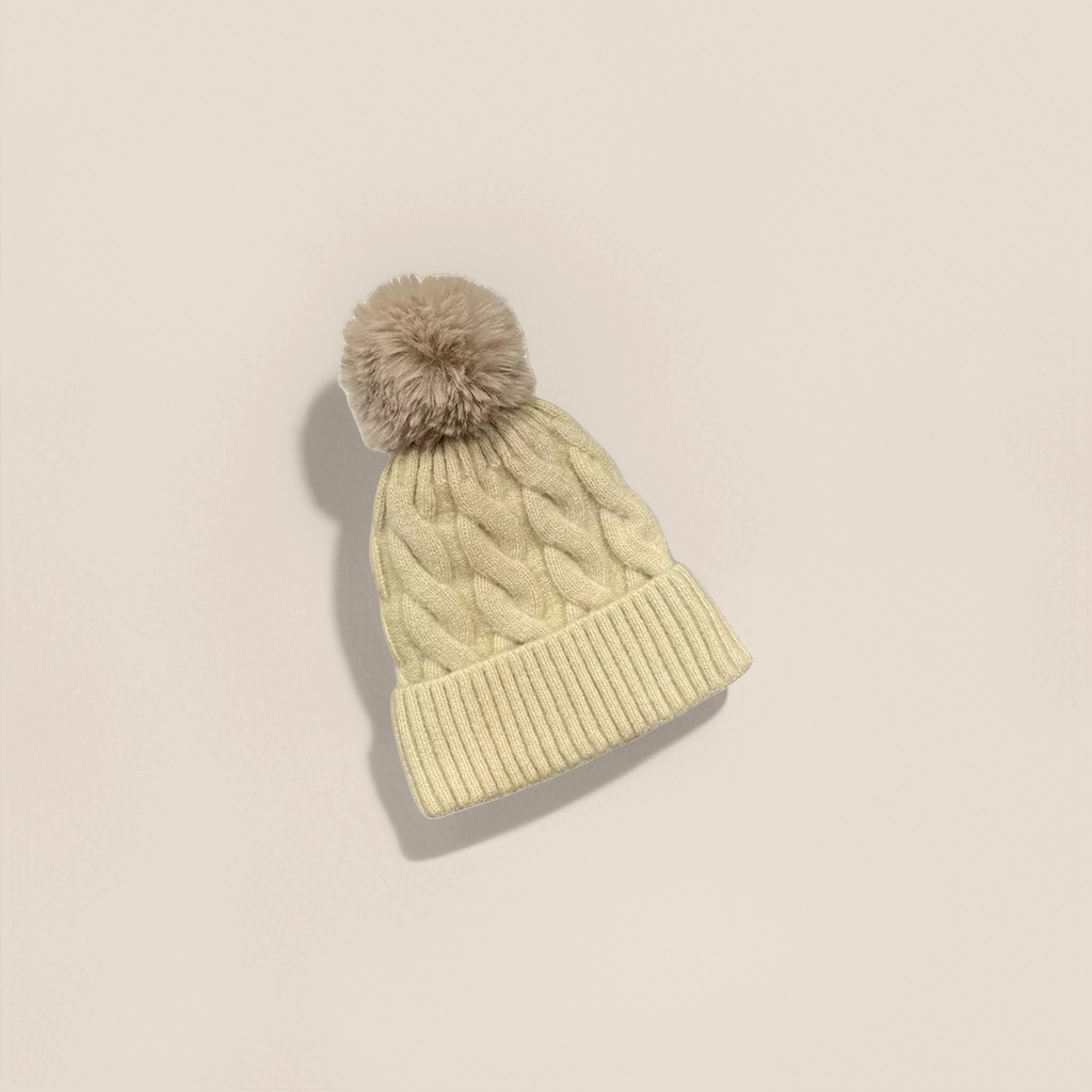 A beige knitted cap with a plush ball for warm autumn and winter women's woolen hat Application Scenario