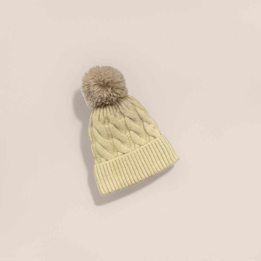 A beige knitted cap with a plush ball for warm autumn and winter women's woolen hat details Picture