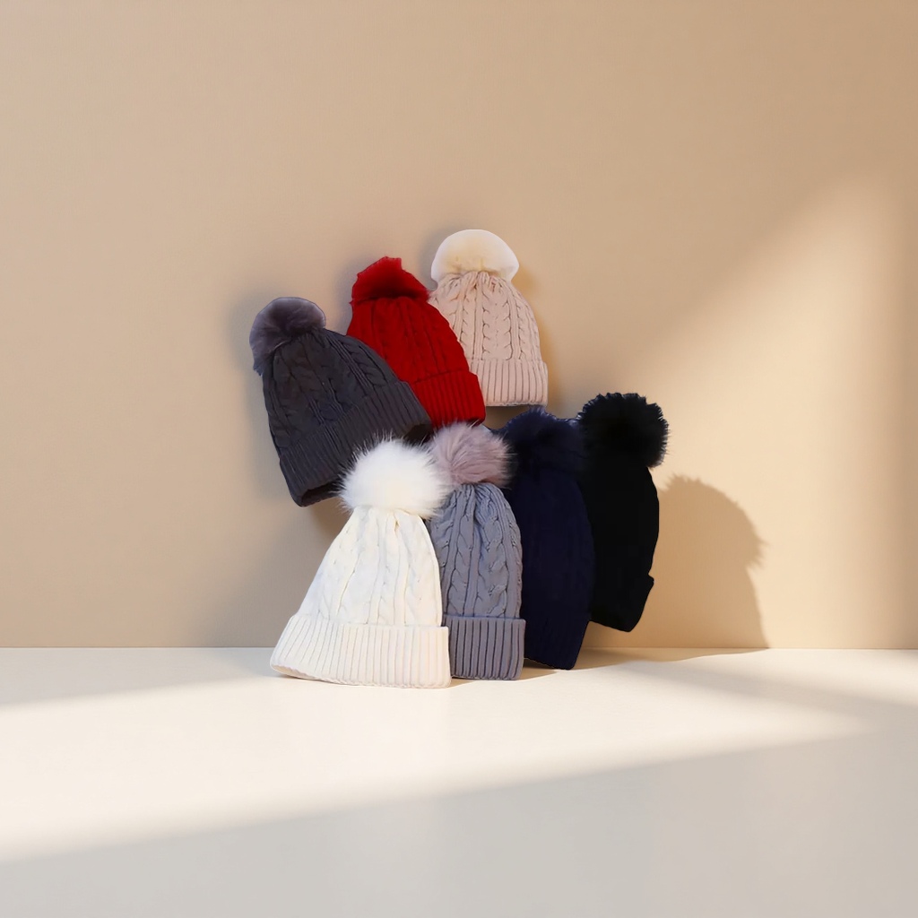 A multi-color knitted woolen cap with large wool ball decoration for warm winter knitted cap details Picture